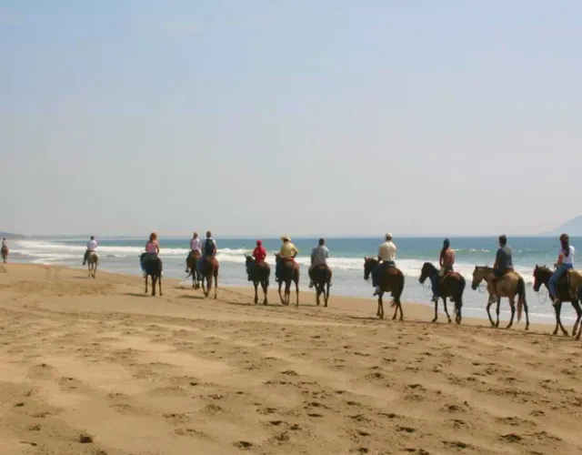 hotel in Barra de Potosí Mexico Horseback Riding on the Beach